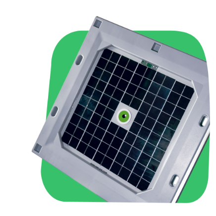 A Tessera sensor — a solar-topped tile with its green measurement eye at the center — shown at an angle